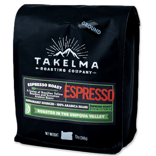 A 12 oz black bag of ground, espresso roast coffee from Takelma Roasting Co.