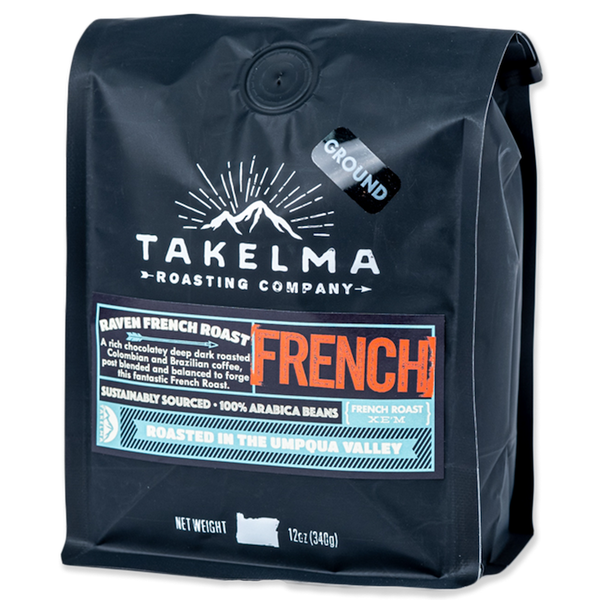 A 12 oz black bag of ground, dark roast coffee from Takelma Roasting Co.