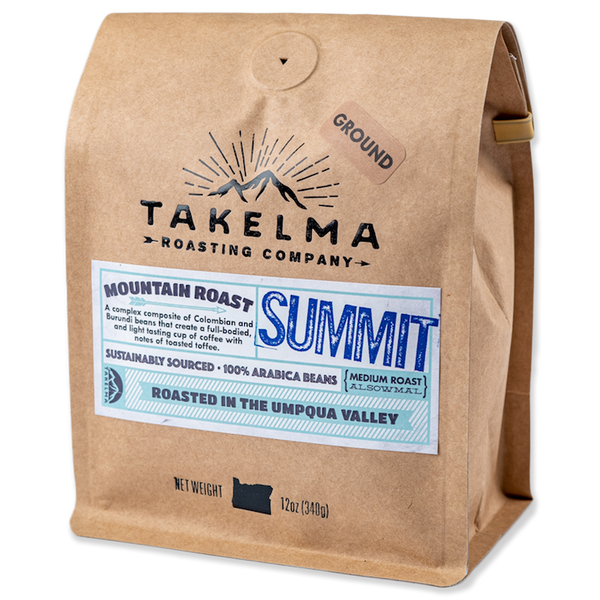 A 12 oz light brown bag of ground, medium roast coffee from Takelma Roasting Co.