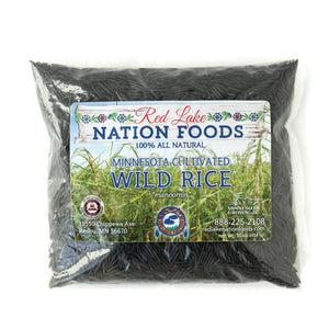 A photo showing the front of a bag of Red Lake Nation Wild Rice on a white background.
