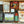 Load image into Gallery viewer, Display of items that can make up a Some Like it Hot Box, including one bag of Pinole from Ramona Farms, one bag of brown Ramona Farms Teppary Beans, one bottle of Sakariacha hot sauce from Sakari Farms, one bag of tea from Sakari Farms, one bag of 12 assorted Bedré meltaways, two jars of culinary salts, a bottle of Extra Virgin Olive Oil from Séka Hills and a bag of Red Lake Nation wild rice.
